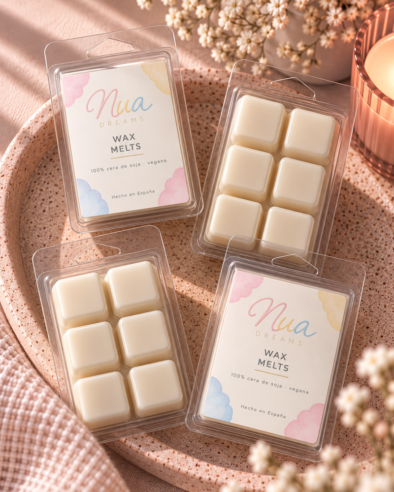 Wax melts en tableta: cuatro tabletas de cera en su blíster sobre una bandeja rosa